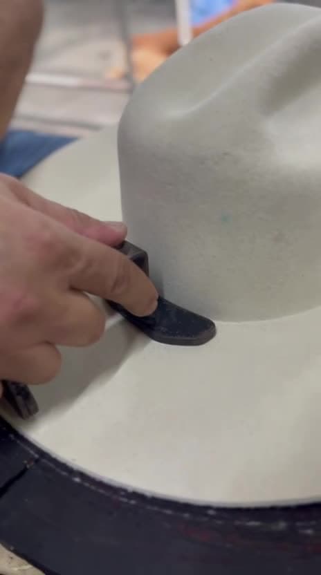 Steam shaping a premium felt hat body — precision molding